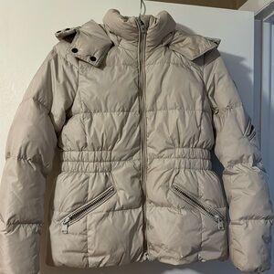 Zipper missing the hook. Small place on bottom front left.